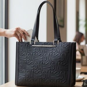 Steve Madden Purse,  Embossed SM all over print, black, gold hardware